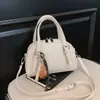 Bolsa de almofada de boliche rosa de designer nicho para mulheres, novo modelo 2026, bolsa transversal de luxo leve de nicho de alta qualidade