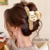 Pinza de garra de felpa floral grande para cabello grueso, pinza de pelo tejida de alta gama para otoño e invierno, nuevo pinza de tiburón 2026 accesorio para el cabello para mujer