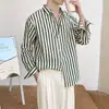 Camisa de manga larga a rayas para primavera y otoño, moderna y elegante para hombre, con un ambiente fresco y artístico, casual y cómoda, estilo japonés, y que irradia un aura relajada y elegante.