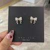 Pendientes de botón estilo coreano Dongdaemun con lazo de perla pequeña y adorable lazo de circonita con microincrustaciones, aguja de plata S925