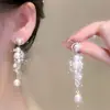 Brincos de Pérola Pétala Francesa com Agulha de Prata S925 Feminino 2025 Novo Estilo Quente Outono e Inverno Brincos Estilo Festivo Acessórios de Orelha