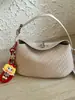 Bolso de moda transfronterizo 2026, bolso de mano versátil y de patrón tejido simple, bolso cruzado de alta calidad con textura tipo dumpling