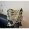 Novo 2025 Transfronteiriço Casual Simples Lona Bolsa Feminina Primavera Versátil Bolsa de Ombro Grande Capacidade Moderna Bolsa Transversal