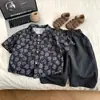 Conjunto de Verano para Niños 2026 Nueva Ropa de Verano Infantil Camisa de Manga Corta Delgada y Shorts Conjunto de Dos Piezas Estilo Coreano Moderno