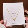 Colar Pingente Coração Vazado com Zircônia Microcravejada Estilo Coreano para Mulheres Luxo Leve Temperamento Sentido de Alto Padrão Acessórios de Corrente para Clavícula Corrente de Pescoço
