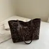 2026 Nova Bolsa Tote de Ombro Único de Grande Capacidade, Elegante e da Moda, para o Dia a Dia de Mulheres, Bolsa Casual Nova de Nicho para Mulheres