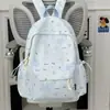 Nova mochila estilo floresta ins de alta aparência, fresca, doce e fofa com tema de estrela para alunos do ensino fundamental e médio, bolsa de ombro dupla leve e simples