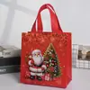 Bolsas de regalo rojas en stock, bolsas de tela no tejida serie navideña, bolsas de regalo tipo tote con sensación de alta gama