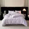 Juego de cuatro piezas de algodón lavado jacquard de lujo, funda de edredón de algodón suave para la piel, nuevo modelo 2026, sensación de alta gama, ropa de cama de 1.8m