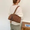 Bolso de mano tejido retro transfronterizo, nueva colección 2026 para mujer, diseño de alta gama, gran capacidad, adecuado para ir al trabajo, bolso de hombro, y se puede llevar bajo el brazo