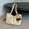 Bolsa tote feminina estilo coreano transfronteiriça 2026 nova moda versátil bolsa de ombro design retrô de nicho bolsa de ombro casual