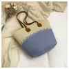 Bolsa de Palha Tecida para Férias na Praia Feminina 2026 Nova Moda Primavera Verão Cesta de Vegetais Tecida à Mão Bolsa de Ombro Única