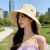 Sombrero de sol a cuadros florales estilo coreano con lazo plisado y ala ancha, adecuado para vacaciones al aire libre, sesiones de fotos y ropa de playa.