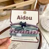 Diadema elástica versátil con temática de cachorros, tacto suave y de alta gama, con lazo, accesorio sencillo para coleta para niñas