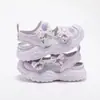 Sandalias Nuevas de Verano 2026 para Niñas Suela Suave Punta Cerrada Zapatos de Princesa Zapatos de Malla para Niños Transpirables Ligeros Sandalias Deportivas