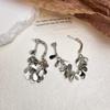 Europa y Estados Unidos viento frío raya geométrica redonda metal pendientes moda mujer simple temperamento pendientes fabricantes pendientes al por mayor