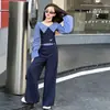 Conjunto de Roupa para Meninas Primavera e Outono 2026 Novo Conjunto de Duas Peças Camisa Listrada de Manga Longa Off-Shoulder com Calça de Cintura Alta Tendência Transfronteiriça