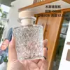 Botella de vidrio para café de extracción en frío creativa y hermosa botella pequeña de vino sellable práctica botella vacía para subempaquetado de vino de frutas casero