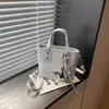 Bolso Pequeño Versátil de Alta Gama para Cruce de Fronteras de Gran Capacidad Nuevo Estilo Primavera 2026 Bolso de Hombro Único para Debajo del Brazo Bolso Cruzado Tipo Cubo para Mujer
