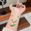 Collar Original Nuevo Fresco de Calavera de Calabaza Esmaltada Colorida con un Toque de Lujo Ligero y Alta Gama, Cadena Larga para Suéter para Mujer
