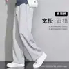 Atacado transfronteiriço de calças casuais populares para homens, apresentando designs afunilados no tornozelo, tecidos finos versáteis e um efeito emagrecedor, perfeitos para primavera e verão, e calças saruel da moda.