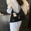 Bolsa de Ombro Transfronteiriça de Grande Capacidade Feminina Nova Outono 2026 Retrô Ombro Único Transversal Casual para o Dia a Dia Bolsa Tote Feminina