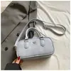 Bolsa de Bowling de Mano Estilo Simple y Dulce Nueva Colección Primavera 2026 Bolso Cruzado Casual de Moda Elegante de Alto Valor para Mujer