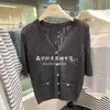 Ropa Zhengqite/Moda Femenina 2026 Botón de Perla Nuevo Cardigan de Bolas de Burbuja 3D Cuello en V Hueco Manga Corta Corte Holgado