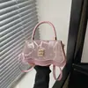 Bolso de hombro tipo axila de diseño de nicho estilo francés para mujer, popular en 2025, bolso cruzado casual elegante y único para mujer