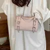 Bolsa feminina de ombro único diagonal para o dia a dia, nova, de tubo redondo, simples, transversal, retrô, nicho, versátil, sensação outono 2026, bolsa de mão