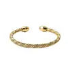 2026 Braceletes Retrô de Fio Torcido Aberto Trançado em Forma de C Mais Vendidos no Exterior para Mulheres Pulseira de Aço Inoxidável Dourado 18K Atacado