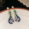 Nuevos pendientes de pipa de estilo chino para mujer, estilo nacional, vintage, con incrustaciones de diamantes, flores y perlas, con personalidad y temperamento únicos, estilo antiguo.