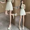 Nova saia curta estilo A retrô chinesa para mulheres, novo modelo de verão 2026, saia curta étnica de cintura alta que afina