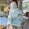 Brisa fresca, suave niebla, mochila con lazo de color azul sal marina de baja saturación para estudiantes de primaria, ligera y cómoda para ir a la escuela