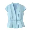 Moda europea y americana transfronteriza para mujer AliExpress INS artículo más vendido top halter de punto acanalado con hilo metálico + conjunto de falda midi