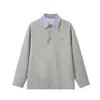 Ropa Vintage Yidao Otoño 2026 Nuevo Estilo Americano Diseño de Moda Falso Dos Piezas Rayas Patchwork Cuello Polo Camiseta de Manga Larga