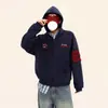 Sudadera Cardigan Bordada Estilo High Street Americano para Hombre Primavera 2026 Marca Retro Moderna Chaqueta con Capucha Holgada Casual Top