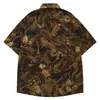 Camisa Floral Vintage Desgastada Color Café de Manga Corta con Cuello y Bolsillos Laterales con Correa Desmontable para el Cuello, Top para Pareja