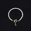 Pulsera de Moda de Venta Caliente Transfronteriza 2026 con Diamantes y 26 Letras, Pulsera de Perlas de Imitación Ovaladas, Disponible para Venta al por Mayor para Mujeres