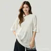 Camiseta de cachemir minimalista y relajada de manga corta para mujer, silueta holgada, cuello redondo, top de punto versátil y favorecedor.