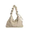 Bolsa Tote Cream Puff para Mulheres 2025 Inverno Nova Tendência Moda Grande Capacidade Leve Dobrada Ombro Transversal