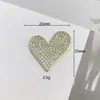 Temperamento lleno de amor de diamante trébol de cuatro hojas aleación accesorios colgante de perla simple accesorios para el cabello versátiles bolsa materiales para ropa