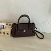 Bolsa de Mão Simples Estilo Coreano Transfronteiriça Feminina 2026 Nova Moda Casual Bolsa de Ombro Único Versátil para o Trabalho Bolsa Transversal