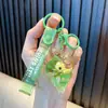 Chaveiro de panda cheio de óleo, garrafinha com areia movediça de maçã, pingente de bolsa, chaveiro de carro, prêmio de máquina de pegar, pequeno presente