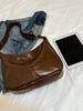 Bolsa Feminina 2025 Nova Vintage Bolsa Dumpling Design de Nicho Moda Simples Fresca Cor Sólida Bolsa de Ombro Grande Capacidade