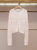 Shenzhen Nanyou Ropa Fina de Mujer Verano Nuevas Llegadas Estilo Dulce Moda Chic Sentido del Diseño Cardigan de Punto Hueco