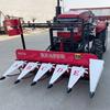 Tractor de cuatro ruedas, máquina cortadora frontal de arroz y trigo de 1,5 m de ancho para cortar cultivos agrícolas y máquinas cortadoras solares.