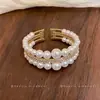 Pulsera multicapa de perlas con cuentas estilo francés, lujo ligero, moda de alta gama, diseño versátil y único, joyería minimalista de nicho