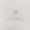 Amazon em estoque novos acessórios de cabelo transparentes de pegada média 2024 primavera presilha tubarão grampo de cabelo liso base em bruto atacado