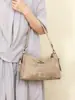 Bolsa de comércio exterior feminina 2025 novo modelo bolsa de mamãe versátil bolsa de ombro de grande capacidade couro macio bolsa tote multicamadas bolsa de axila